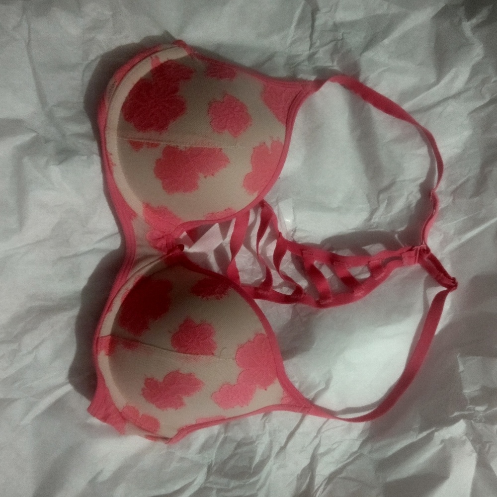 A pink Victoria secret size 32C bra